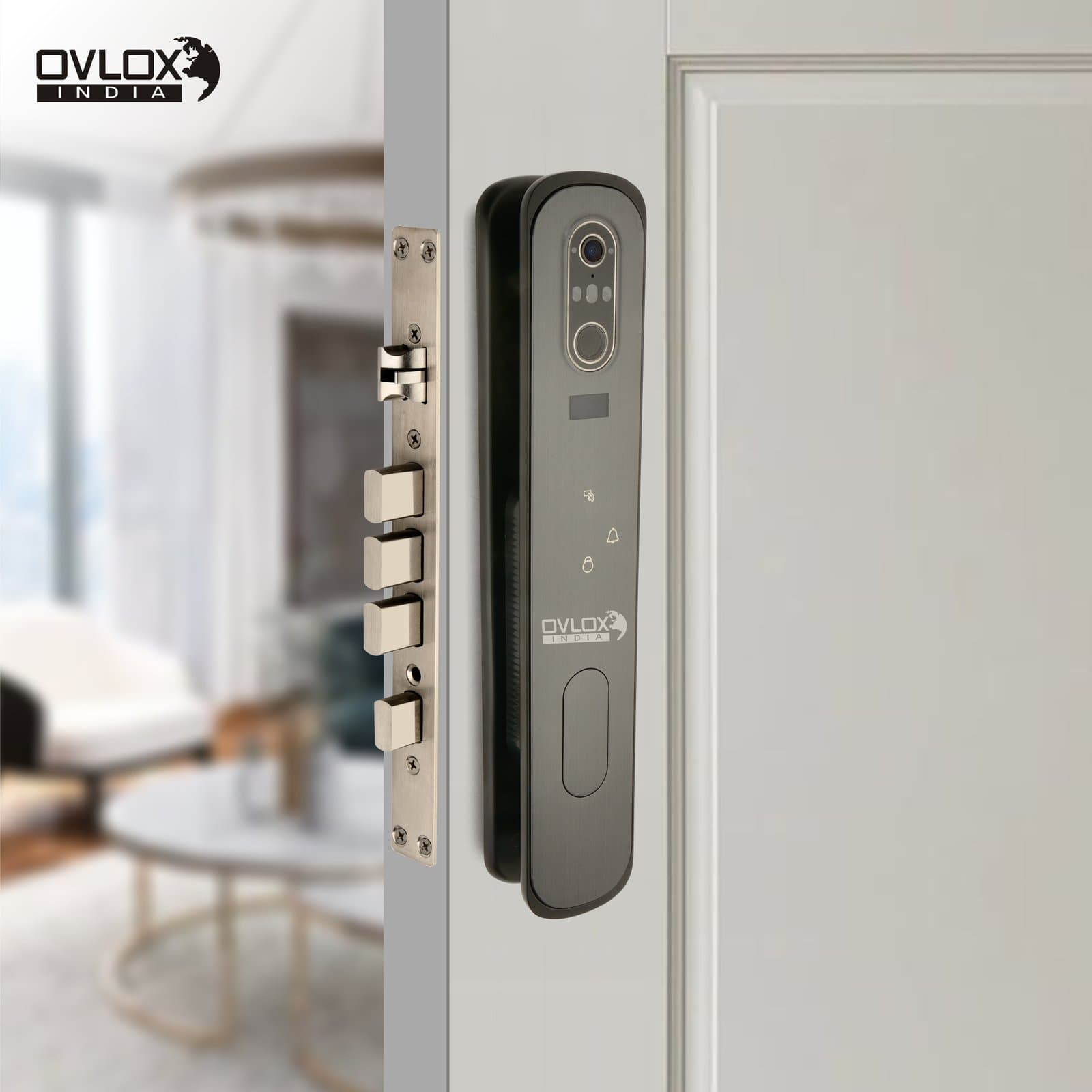 An Ovlox India smart lock fitted to a white apartment door, living room beyond.